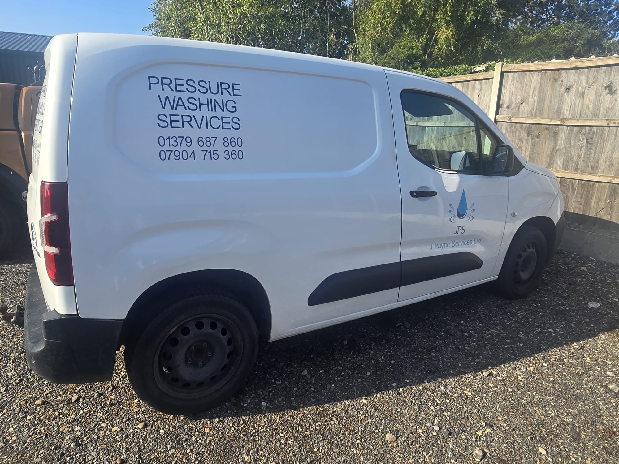 Signwritten J Payne Services pressure washing van